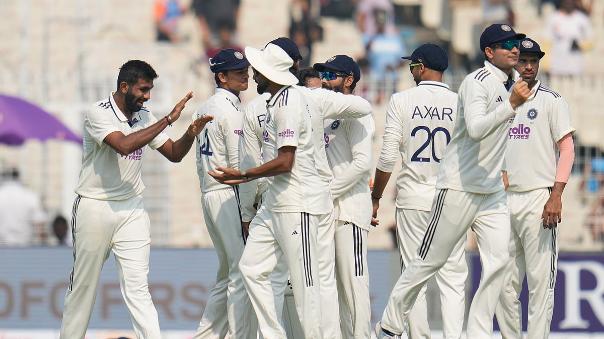  (AP Photo/Aijaz Rahi) : India Vs South Africa, 1st Test Match Day 1: India's Jasprit Bumrah, left, celebrates with teammates after the dismissal of South Africa's Aiden Markram on the first day of the first cricket test match between India and South Africa in Kolkata, India, Friday, Nov. 14, 2025.