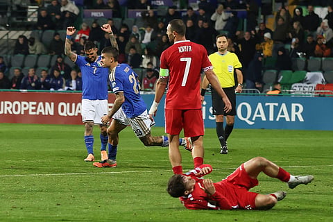 Italy's Gianluca Mancini celebrates after scoring his side's first goal during a group 1, World Cup qualifier soccer match between Moldova and Italy in Chisinau, Moldova.
