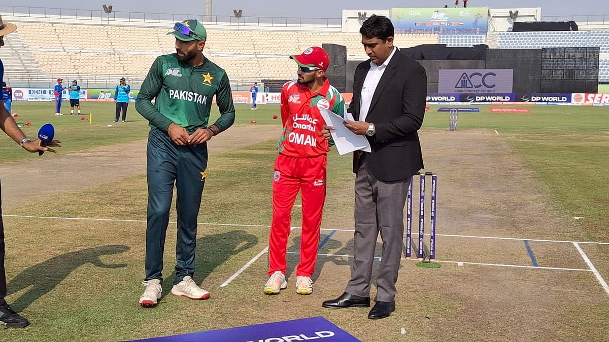 | Photo: X/TheRealPCB : Pakistan A's captain Irfan Khan and Oman's captain Hammad Mirza during the toss for the Asia Cup Rising Stars 2025 match between Pakistan A and Oman on November 14, 2025.