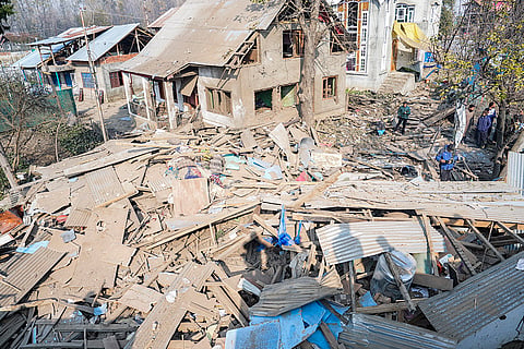Debris at the site after the house of Dr Umar Nabi, who drove the explosive-laden car involved in the Delhi blast, was demolished by security forces, in Jammu and Kashmir's Pulwama district.