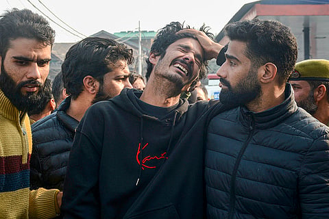 Bereaved family members of the nine persons killed in the accidental blast at Nowgam police station mourn during their tribute ceremony at the Police Control Room, in Srinagar. An accidental blast occurred on the premises of the police station on Friday night while personnel were taking samples of explosive material seized from Faridabad in connection with a "white-collar" terror module case, officials said. 