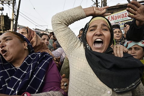 Relatives stage a protest demanding the mortal remains of Mohammad Shafi Parry, a tailor who was killed in an accidental explosion which ripped through Nowgam police station on late Friday night, in Srinagar.