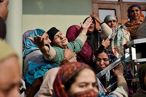 Relatives and family members mourn the death of Mohammed Shadi, who was killed in an accidental explosion at the Nowgam Police Station in Srinagar.