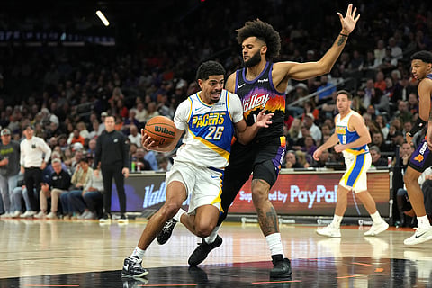 Indiana Pacers guard Ben Sheppard (26) drives on Phoenix Suns forward Isaiah Livers during the second half of an NBA basketball game in Phoenix. 