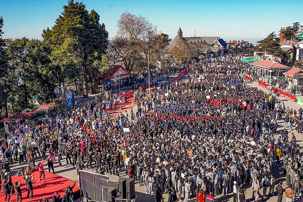 | Photo: PTI : People take part in the 'Anti-Chitta Walkathon' organised by Himachal Pradesh police, in Shimla.