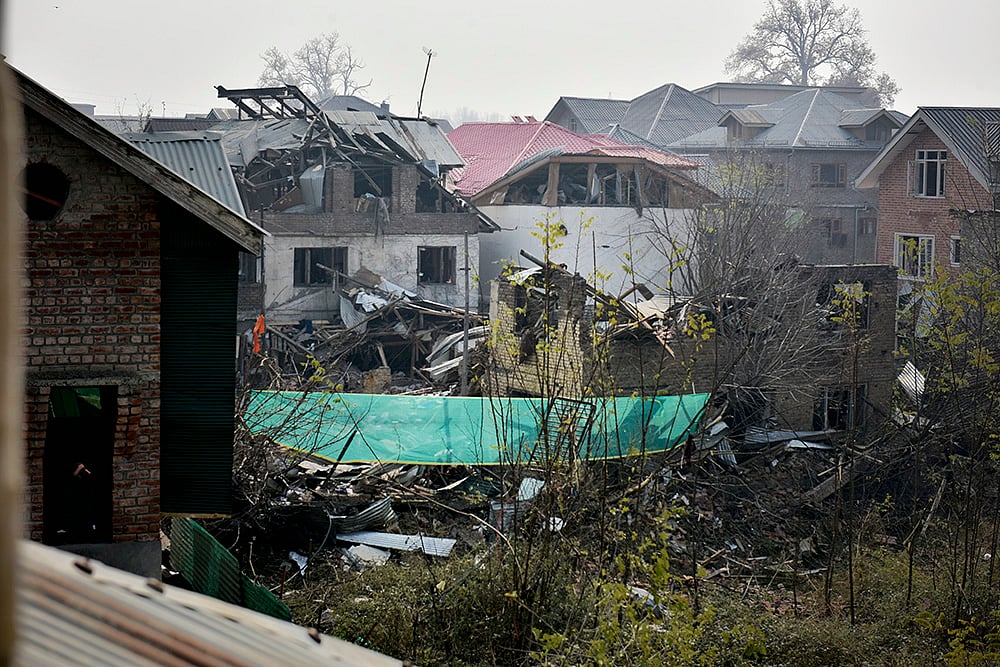 | Photo: Yasir Iqbal : Site of a police station that was destroyed by an accidental explosion in Nowgam, Srinagar, Kashmir.