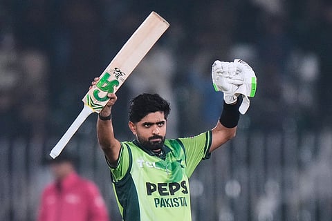 Pakistan's Babar Azam celebrates after his century during the second one day international cricket match between Pakistan and Sri Lanka, in Rawalpindi, Pakistan.