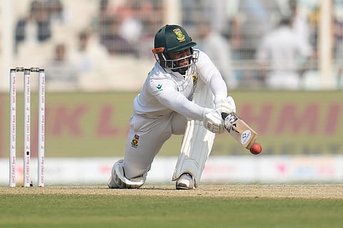 South Africa's captain Temba Bavuma bats on the third day of the first cricket test match between India and South Africa in Kolkata, India.