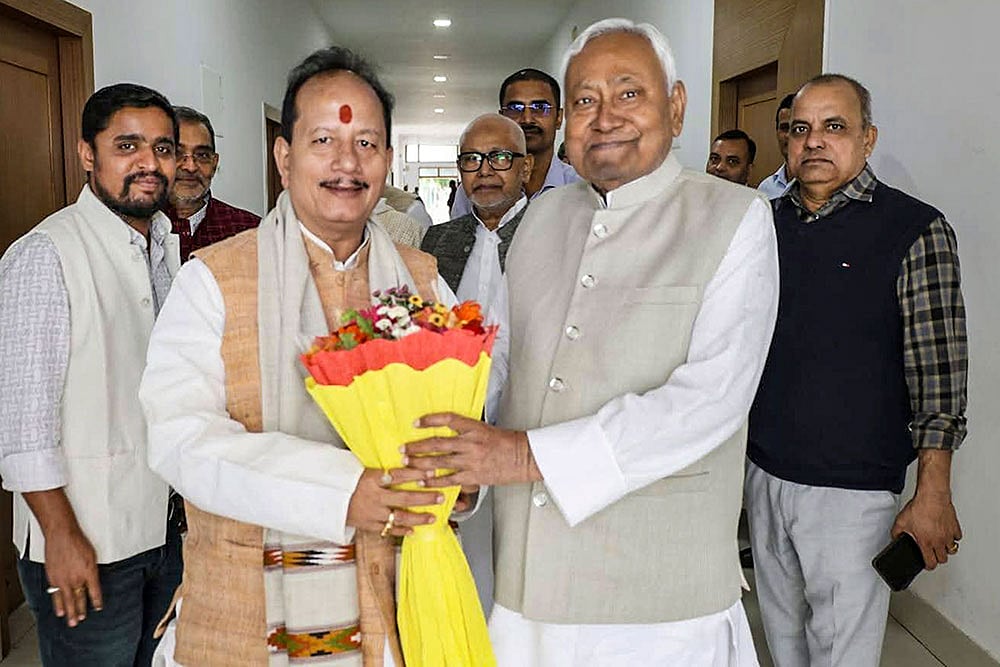 | Photo: @VijayKrSinhaBih/X via PTI  : In this image, Bihar Chief Minister Nitish Kumar being congratulated by Deputy Chief Minister Vijay Kumar Sinha on NDA's victory in the State Assembly elections. 