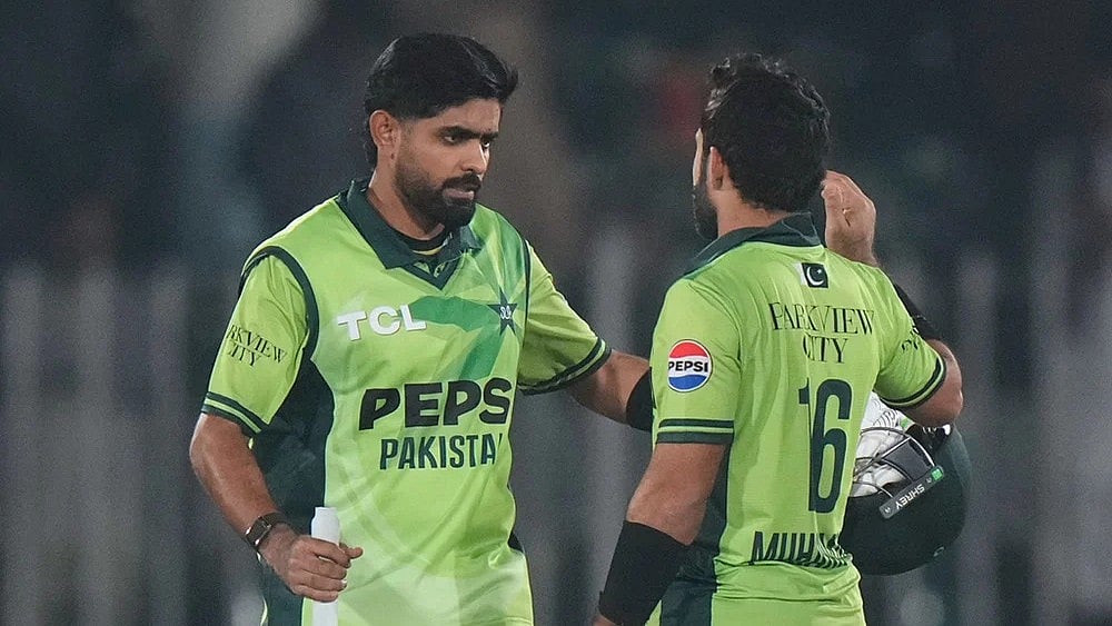| Photo: AP/Anjum Naveed : Pakistan's Babar Azam, lef, celebrates with Mohammad Rizwan after winning the match on the end of the second one day international cricket match between Pakistan and Sri Lanka, in Rawalpindi, Pakistan.