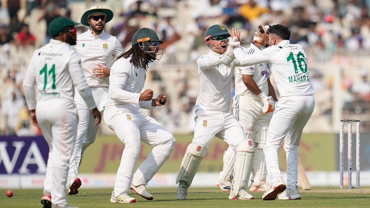 (AP Photo/Aijaz Rahi) : South Africa's Keshav Maharaj, right, and teammates celebrate prematurely for the wicket of India's Rishabh Pant on the third day of the first cricket test match between India and South Africa in Kolkata, India, Sunday, Nov. 16, 2025. 