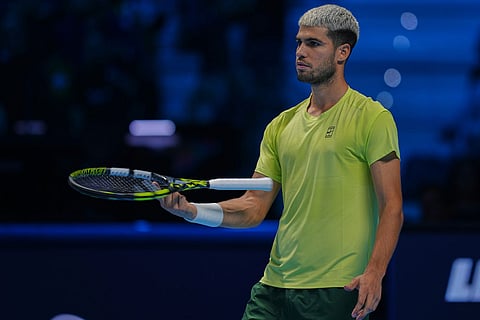 Spain's Carlos Alcaraz spins his racket during semifinal tennis match of the ATP World Tour Finals against Canada's Felix Auger-Aliassime, in Turin, Italy.