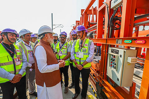 In this image, Prime Minister Narendra Modi during a visit to the under-construction bullet train station, in Surat, Gujarat.