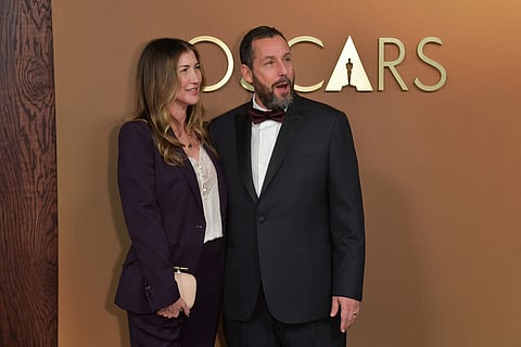 Jackie Sandler, left, and Adam Sandler arrive at the 16th Governors Awards at The Ray Dolby Ballroom in Los Angeles. 