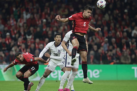 Albania's Berat Djimsiti heads the ball during the World Cup 2026 group K qualifying soccer match between Albania and England, in Tirana, Albania.