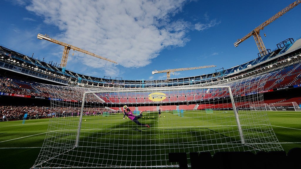 AP : Barcelona's players exercise during the team's first training session at the venue after its renovation at the Camp Nou stadium in Barcelona.