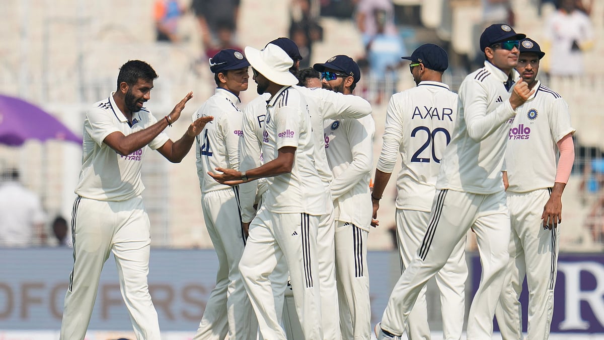  (AP Photo/Aijaz Rahi) : India Vs South Africa, 1st Test Match Day 1: India's Jasprit Bumrah, left, celebrates with teammates after the dismissal of South Africa's Aiden Markram on the first day of the first cricket test match between India and South Africa in Kolkata, India, Friday, Nov. 14, 2025.