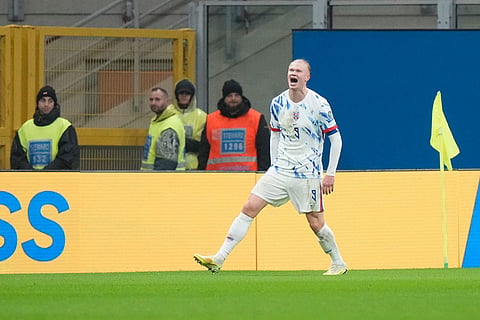 Norway's Erling Haaland celebrates after scoring his side's third goal during the 2026 World Cup Group I qualifier soccer match between Italy and Norway in Milan, Italy.