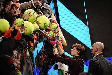 Italy's Jannik Sinner with fans after winning the final tennis match of the ATP World Tour Finals against Spain's Carlos Alcaraz, in Turin, Italy.