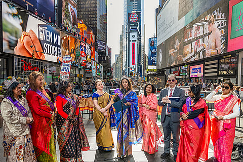 Deputy Commissioner of International Affairs Dilip Chauhan, Consul Head of Chancery at the Consulate General of India in New York Pragya Singh and others during the 'Saree Goes Global' event held in Times Square, New York, USA. 