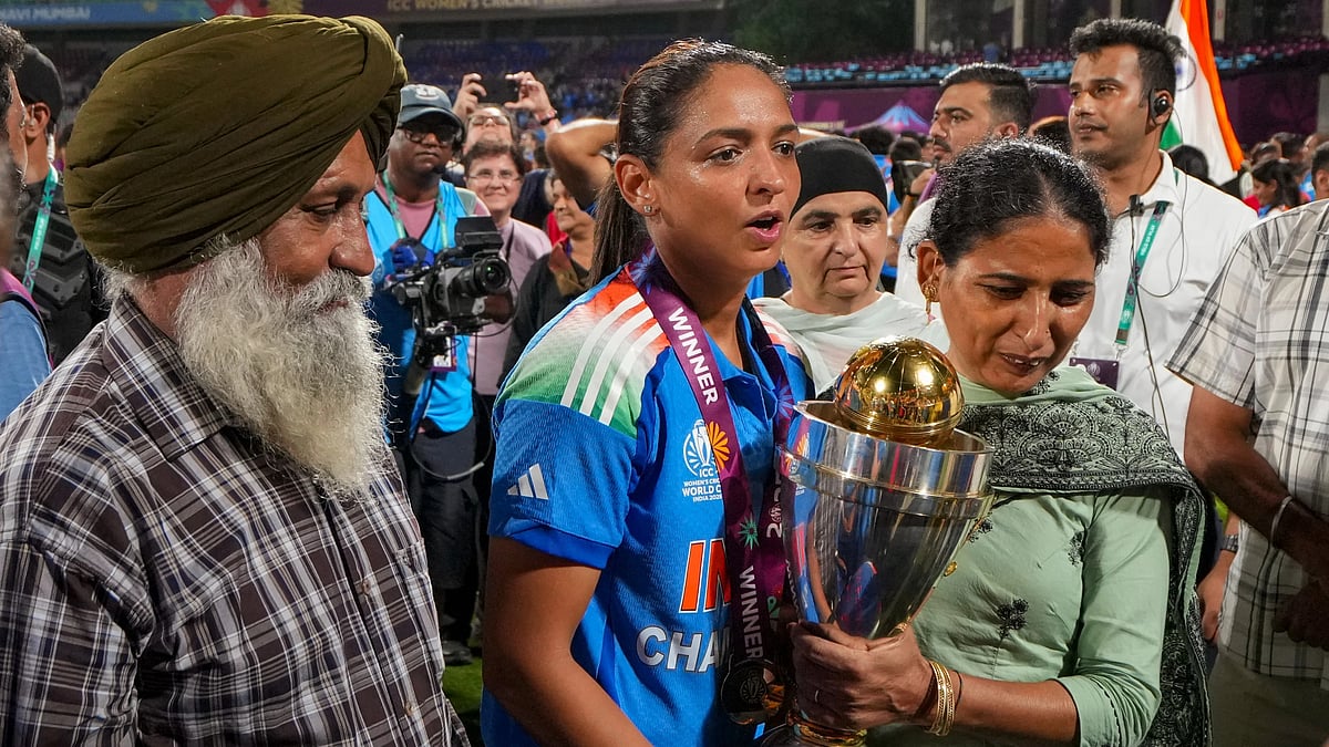 PTI : India captain Harmanpreet Kaur, centre, with her family after winning the ICC Women's World Cup 2025, at the DY Patil Stadium in Navi Mumbai.
