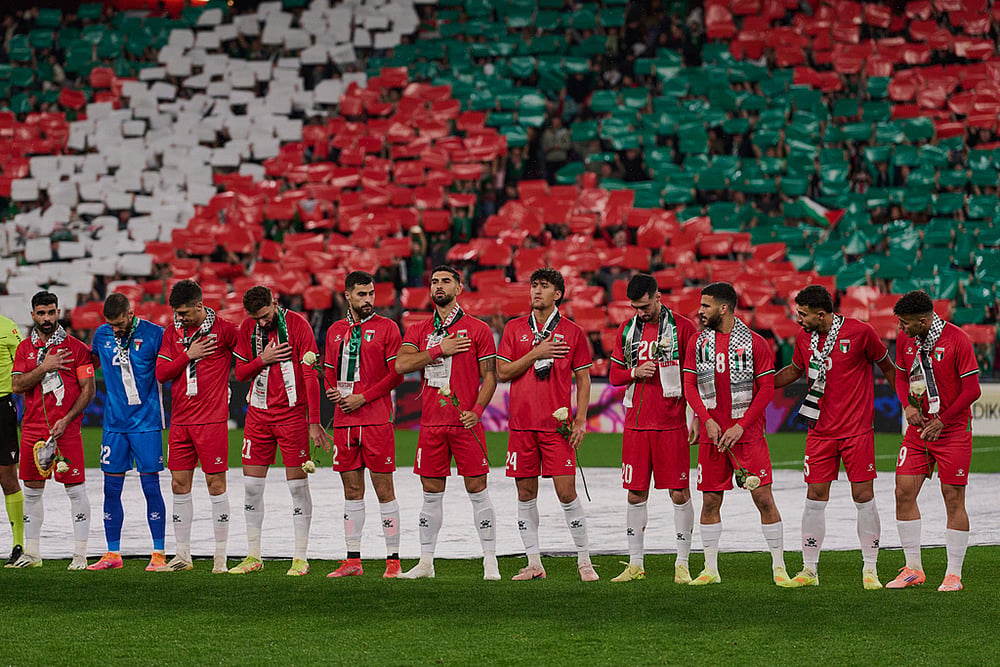| Photo: AP/Miguel Oses : Palestinian players line up ahead of a friendly match against Spanish players from the Basque Country, held to protest Israel's military actions in Gaza, in Bilbao, Spain.