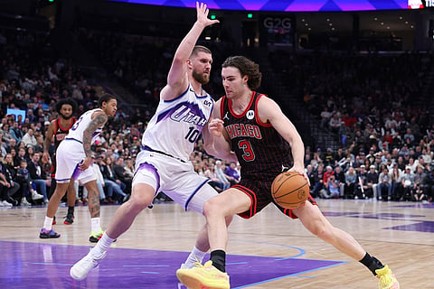 Chicago Bulls guard Josh Giddey (3) drives against Utah Jazz guard Svi Mykhailiuk (10) during the second half of an NBA basketball game in Salt Lake City. 