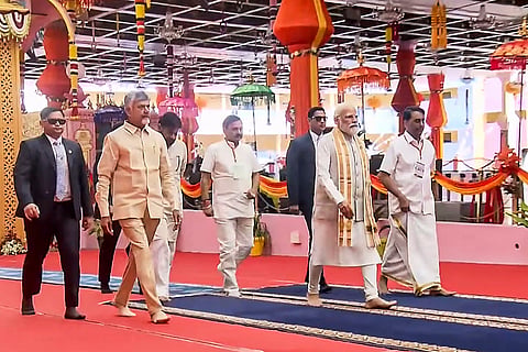 Prime Minister Narendra Modi at Mahasamadhi of Sri Sathya Sai Baba to pay obeisance, in Puttaparthi, Andhra Pradesh. State CM N. Chandrababu Naidu also seen. 