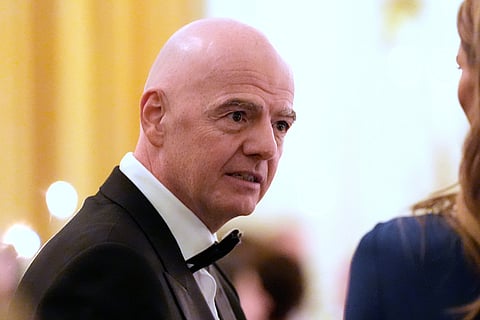 FIFA President Gianni Infantino arrives for a dinner with President Donald Trump and Saudi Arabia's Crown Prince Mohammed bin Salman in the East Room of the White House in Washington. 