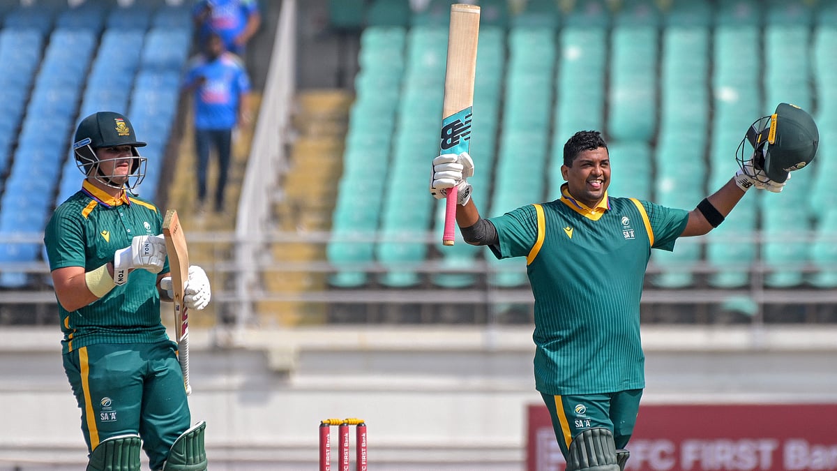 PTI : South Africa A's Rivaldo Moonsamy, right, celebrates his century during the third unofficial ODI against India A in Rajkot.