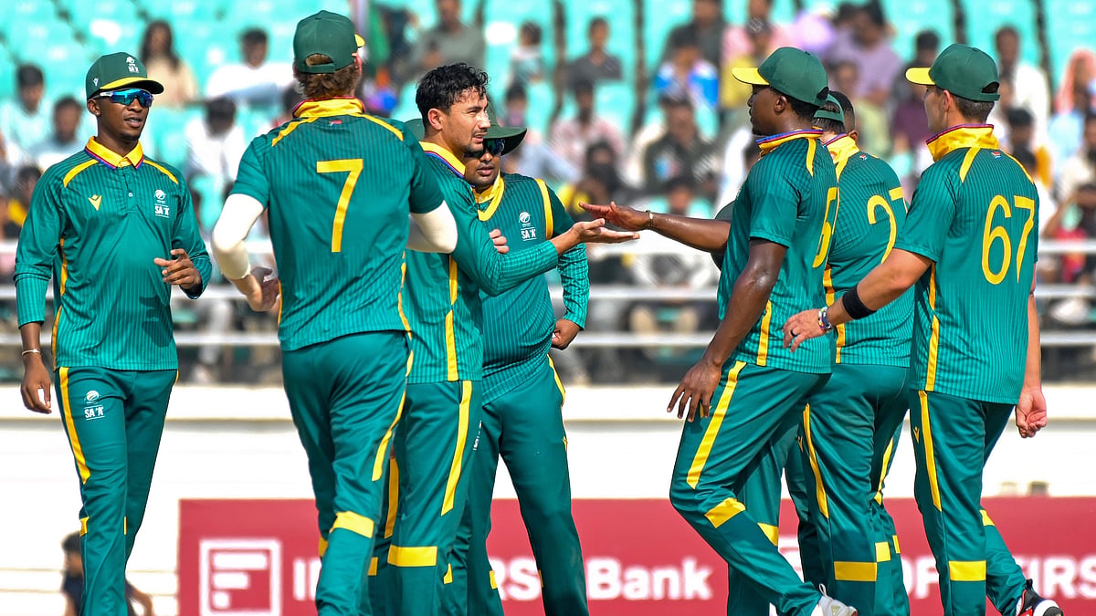 Photo: PTI : South Africa A players celebrate the wicket of an India A batter during the third unofficial ODI in Rajkot.