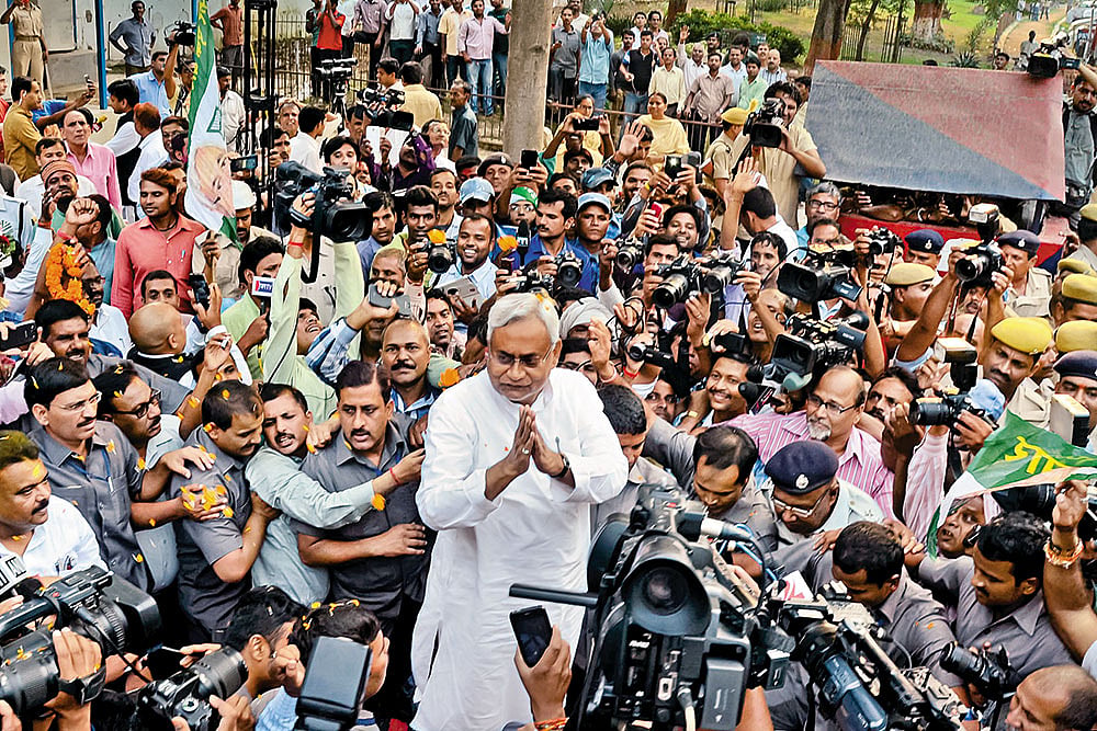 An Eventful Journey: Nitish greets supporters in Patna after victory in the 2015 Bihar state election - | Photo: AP