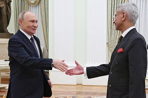 Russian President Vladimir Putin, left, and Indian Foreign Minister Subrahmanyam Jaishankar shake hands during their meeting at the Senate Palace of the Kremlin in Moscow, Russia.