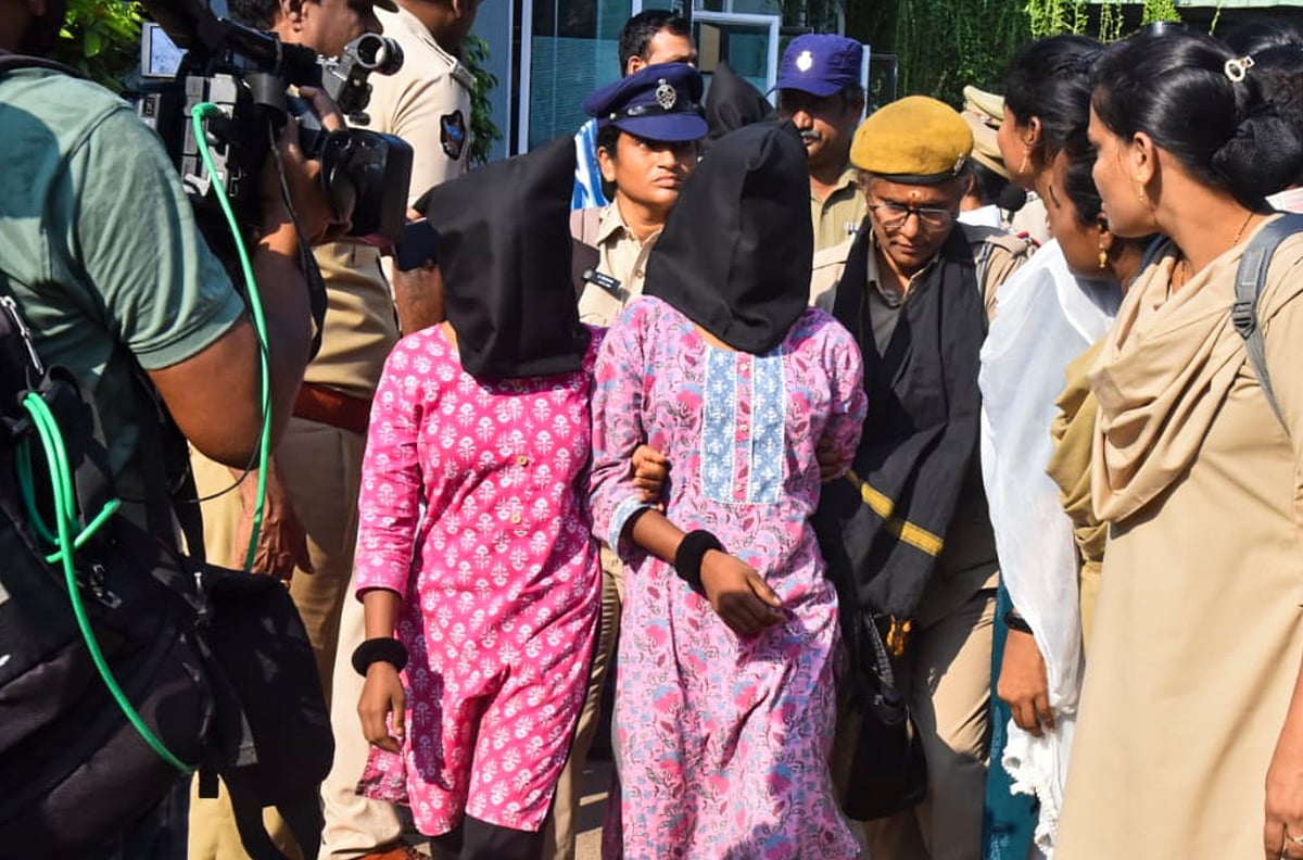 PTI : Vijayawada: Police personnel with arrested Maoists in a coordinated intelligence-led operation, in Vijayawada, Andhra Pradesh, Wednesday, Nov. 19, 2025. 