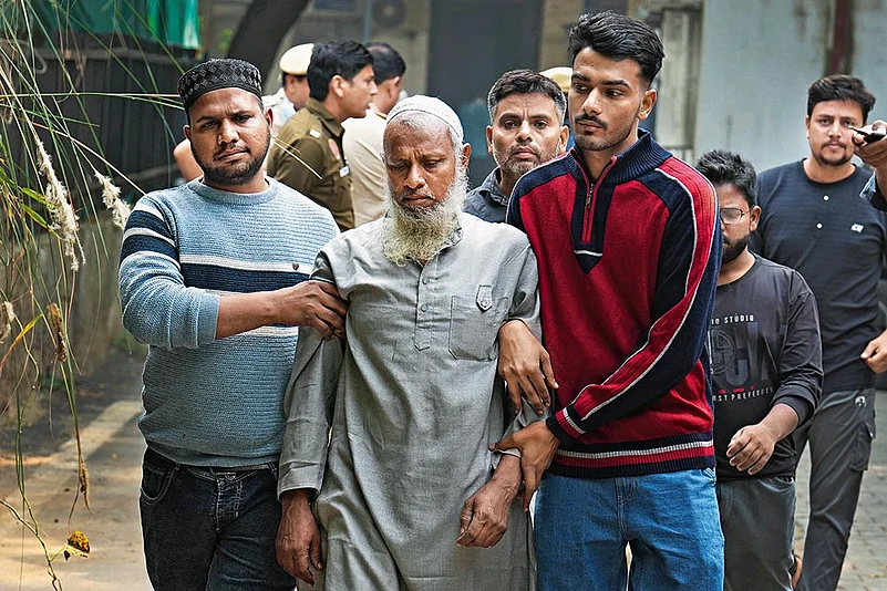 Relatives of Noman, one of the victims, at the Lok Nayak Jaya Prakash Hospital