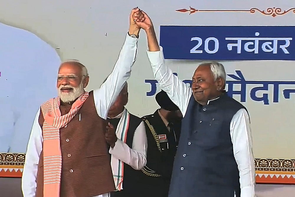 Prime Minister Narendra Modi with newly sworn-in Bihar Chief Minister Nitish Kumar during the swearing-in ceremony, at Gandhi Maidan in Patna. - | Photo: @Jduonline via PTI 
