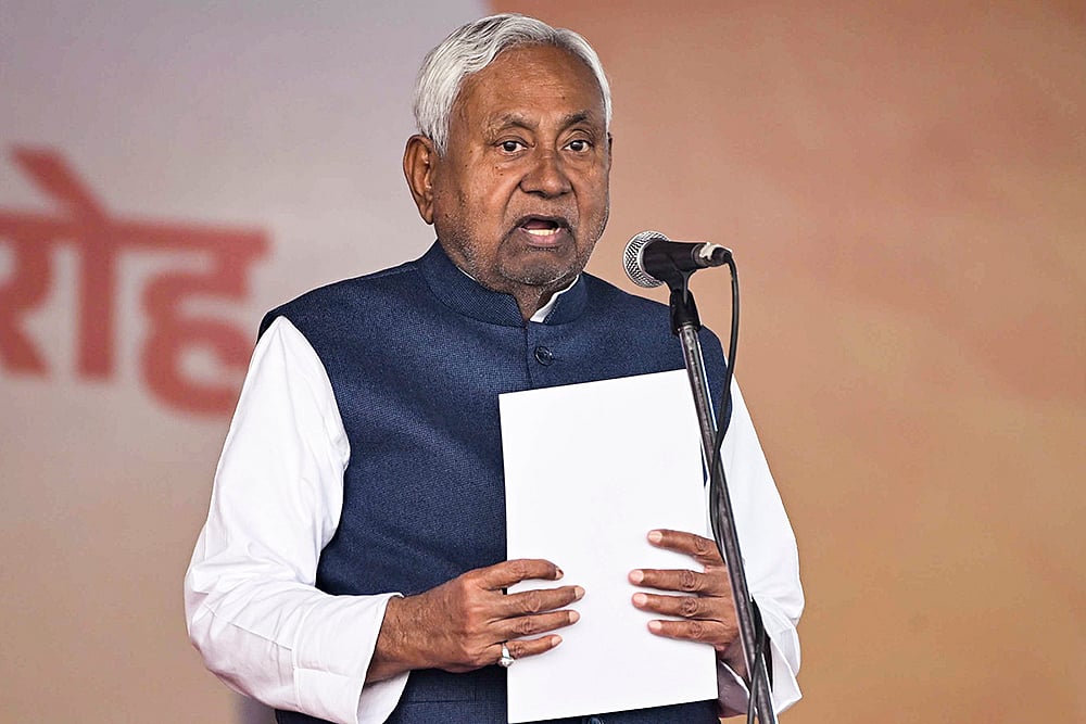 | Photo: PTI : JD(U) supremo Nitish Kumar takes oath as the Chief Minister of Bihar during the swearing-in ceremony, at Gandhi Maidan in Patna. Nitish took the oath as CM for a record 10th time. 