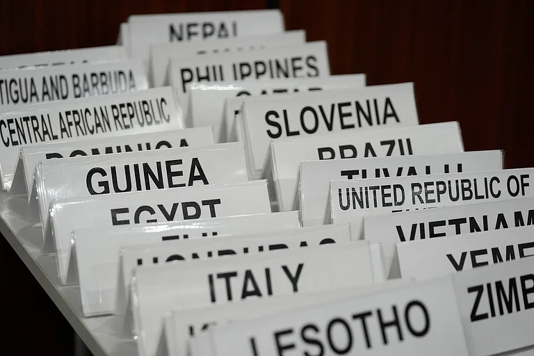 Name cards for countries sit on a table at the COP30 U.N. Climate Summit, Thursday, Nov. 13, 2025, in Belem, Brazil. - Fernando Llano