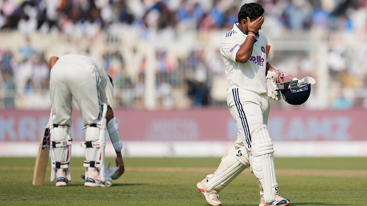 | Photo: AP/Aijaz Rahi : India's Rishabh Pant reacts as he walks off the field after losing his wicket on the third day of the first cricket test match against South Africa in Kolkata on Sunday, November 16, 2025.