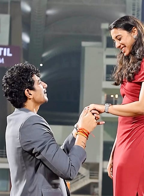 World Cup-winning Indian women's cricket team star Smriti Mandhana being proposed by music composer Palash Mucchal for marriage at the DY Patil Stadium, in Navi Mumbai. 