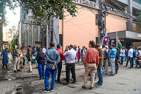 People evacuate buildings after tremors were felt due to an earthquake, in Kolkata. Tremors were felt across West Bengal and parts of the northeast on Friday morning, as an earthquake of magnitude 5.7 jolted Bangladesh's Narsingdi. 