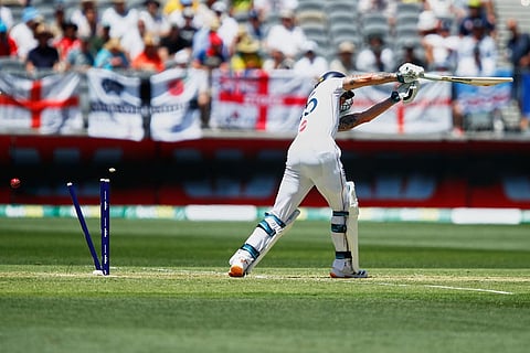 England's captain Ben Stokes is bowled out by Australia's Mitchell Starc during the first Ashes cricket test match between Australia and England in Perth.