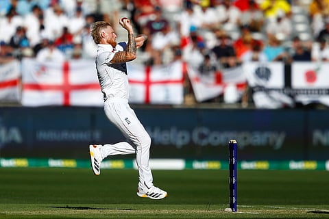 England's captain Ben Stokes bowls a delivery during the first Ashes cricket test match between Australia and England in Perth.