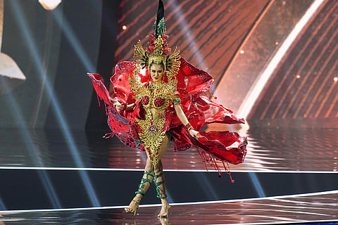 Miss Laos Lattana Munvilay competes in the national costume competition at the Miss Universe Beauty Pageant in Nonthaburi province, Thailand.