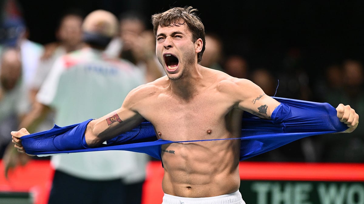 Flavio Cobolli ripped his shirt apart while celebrating his win over Zizou Bergs