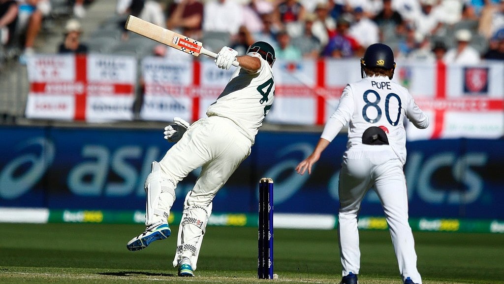 (AP Photo/Gary Day) : Australia's Cameron Green loses his balance after getting hit on his helmet by a delivery during the first Ashes cricket test match between Australia and England in Perth, Friday, Nov. 21, 2025.