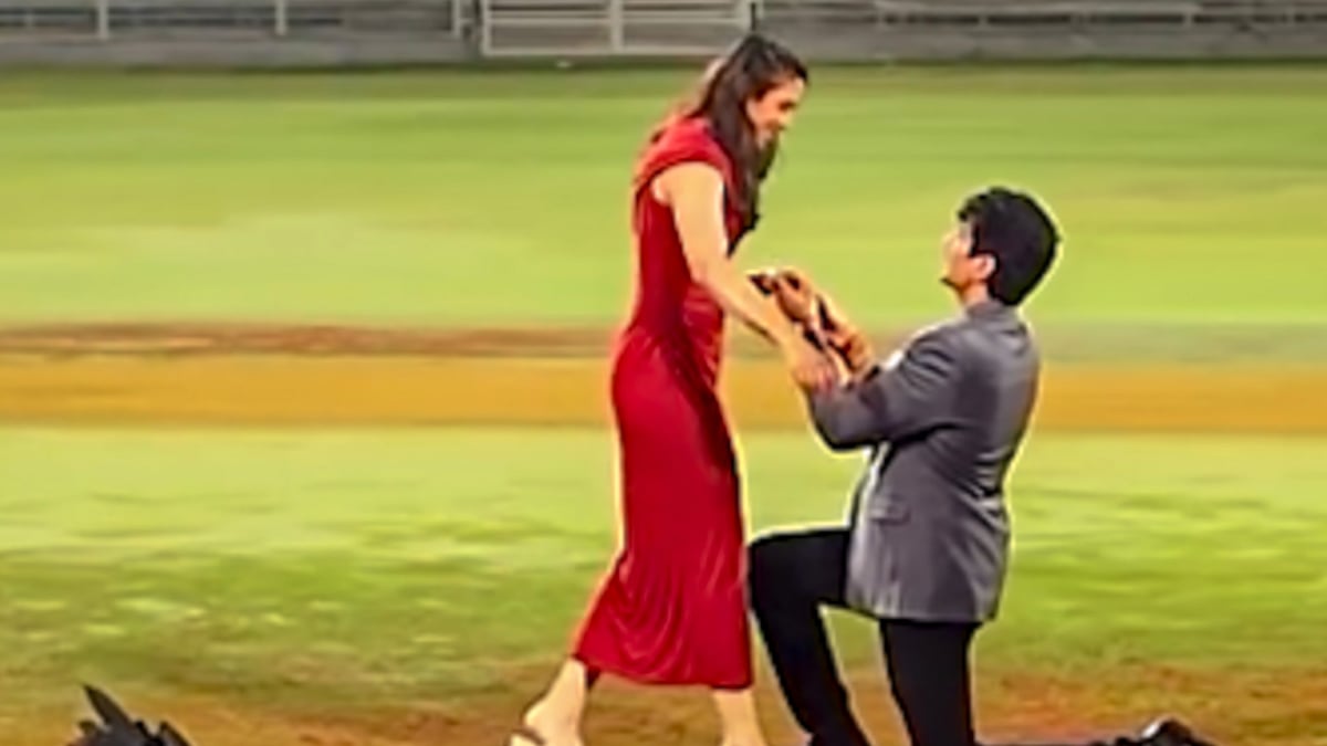 @palash_muchhal/Instagram via PTI Photo : Music composer Palash Muchhal proposes to World Cup-winning Indian women's cricket team star Smriti Mandhana at the DY Patil Stadium, in Navi Mumbai.