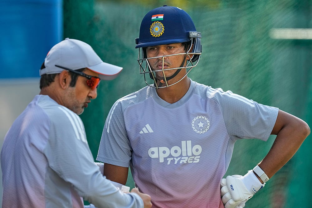 | Photo: AP/Anupam Nath : India's chief coach Gautam Gambhir, left, talks to Yashasvi Jaiswal during a practice session at net ahead of the second test match between India and South Africa in Guwahati.