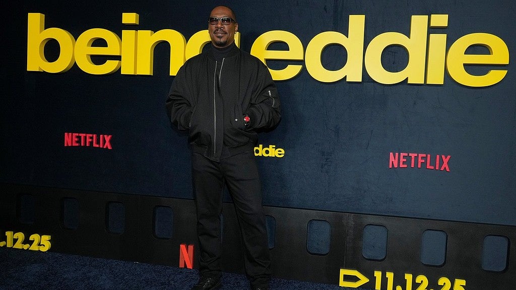 Jordan Strauss/Invision/AP) : Eddie Murphy arrives at the premiere of "Being Eddie" on Wednesday, Nov. 12, 2025, at Netflix Tudum Theater in Los Angeles. 
