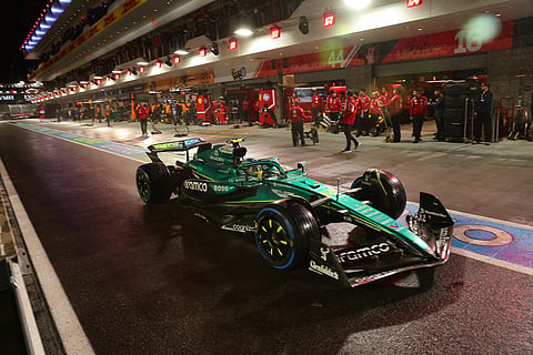Aston Martin driver Fernando Alonso of Spain leaves the pits during a qualifying session at the Formula One Las Vegas Grand Prix Auto Race, in Las Vegas.  